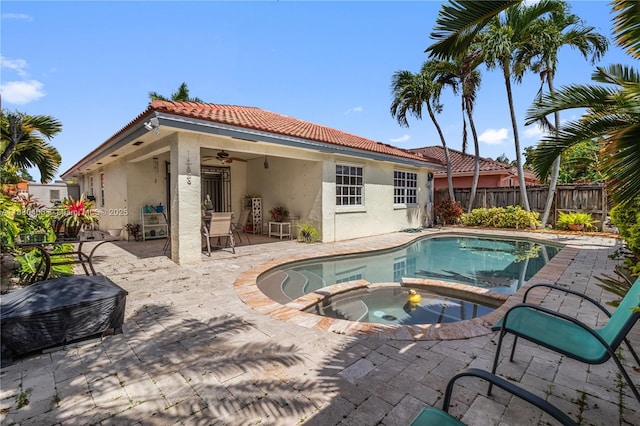 5443 SW 143rd Ct, Miami, FL 33175 - view of swimming pool featuring a ceiling fan, a patio, and a pool with connected hot tub