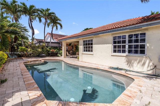 5443 SW 143rd Ct, Miami, FL 33175 - view of pool featuring a patio area and a pool with connected hot tub