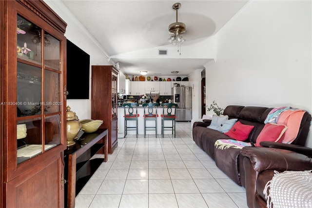 5443 SW 143rd Ct, Miami, FL 33175 - living area featuring a ceiling fan, vaulted ceiling, and light tile patterned flooring