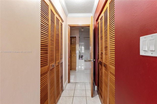 5443 SW 143rd Ct, Miami, FL 33175 - hallway with ornamental molding and light tile patterned flooring