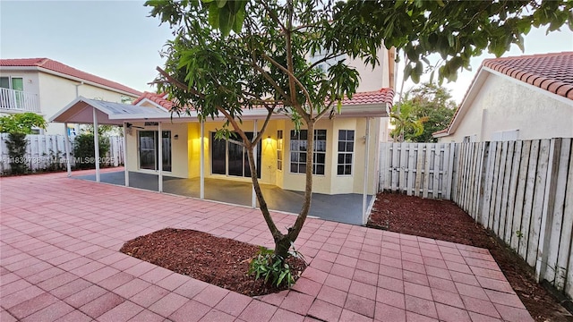 1336 NW 129th Way, Sunrise, FL 33323 - fenced backyard featuring a patio