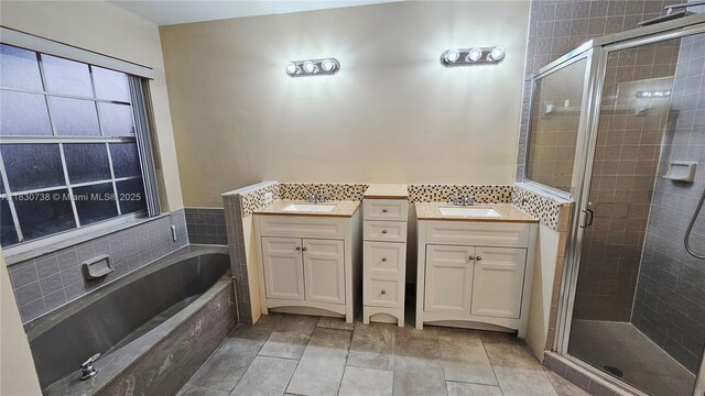 1336 NW 129th Way, Sunrise, FL 33323 - bathroom featuring vanity, a shower stall, and a bath