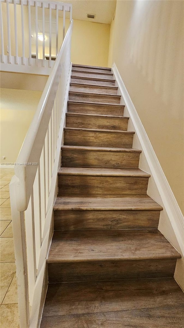1336 NW 129th Way, Sunrise, FL 33323 - stairway featuring tile patterned flooring