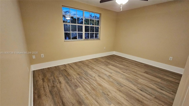 1336 NW 129th Way, Sunrise, FL 33323 - unfurnished room with wood finished floors and a ceiling fan