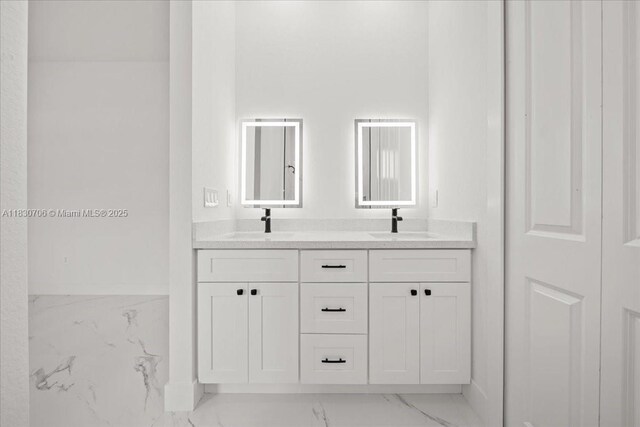 1212 Edelweiss St E, Lehigh Acres, FL 33974 - bathroom featuring marble finish floors and double vanity
