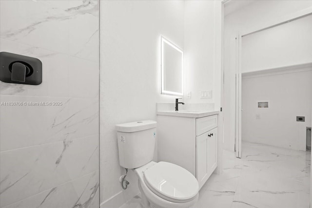 1212 Edelweiss St E, Lehigh Acres, FL 33974 - bathroom featuring marble look tile flooring and vanity