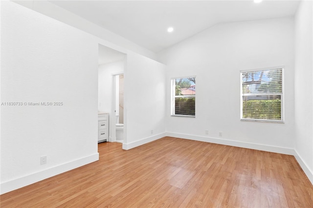 324 NW 107th Ave, Pembroke Pines, FL 33026 - spare room featuring light wood-style floors, recessed lighting, and high vaulted ceiling