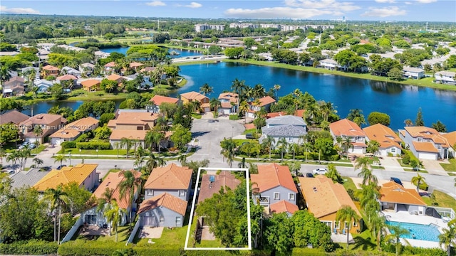 324 NW 107th Ave, Pembroke Pines, FL 33026 - aerial view of residential area featuring property parcel outlined and a nearby body of water