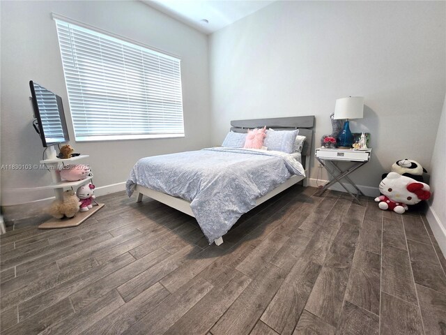 16190 Melogold Dr, Loxahatchee, FL 33470 - bedroom with wood finished floors and baseboards