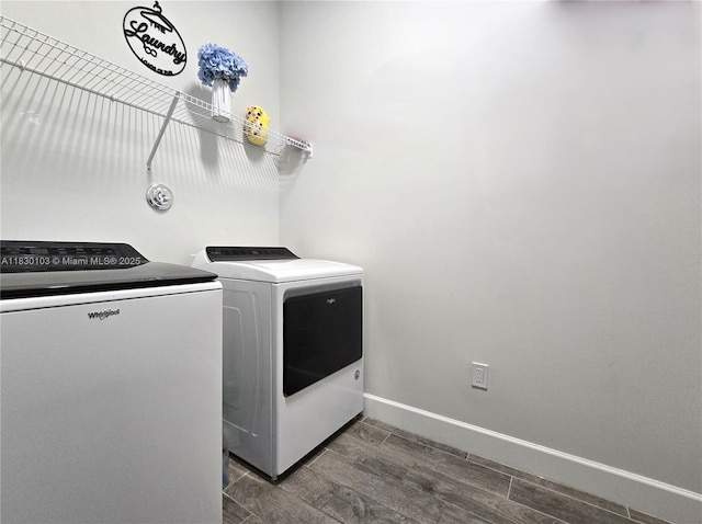 16190 Melogold Dr, Loxahatchee, FL 33470 - laundry area featuring washing machine and dryer and wood tiled floors