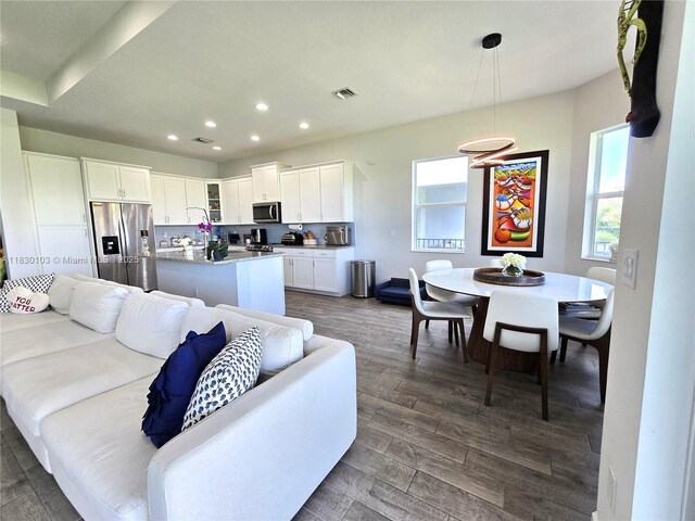 16190 Melogold Dr, Loxahatchee, FL 33470 - living room featuring recessed lighting and dark wood-style flooring
