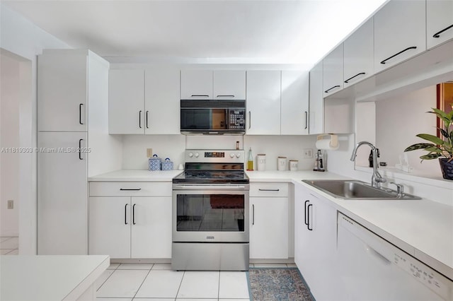 3650 Environ Blvd Unit 502, Lauderhill, FL 33319 - kitchen featuring black microwave, stainless steel electric range oven, dishwasher, and light countertops