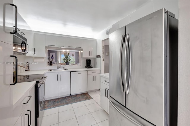 3650 Environ Blvd Unit 502, Lauderhill, FL 33319 - kitchen featuring stainless steel appliances, light tile patterned floors, and light countertops