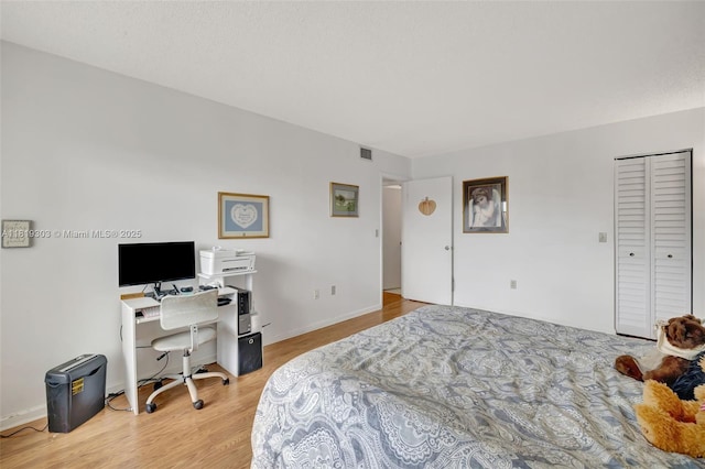 3650 Environ Blvd Unit 502, Lauderhill, FL 33319 - bedroom with an office area and light wood-style flooring