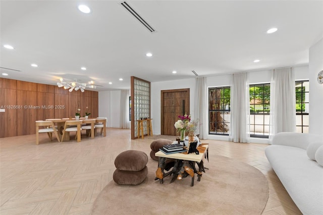 15202 SW 80th Ave, Palmetto Bay, FL 33157 - living room featuring recessed lighting and wood walls