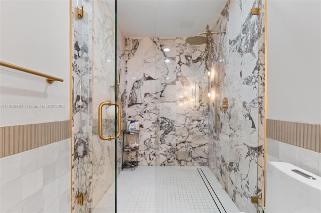 15202 SW 80th Ave, Palmetto Bay, FL 33157 - full bathroom featuring tile walls, a marble finish shower, and a wainscoted wall
