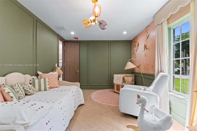 15202 SW 80th Ave, Palmetto Bay, FL 33157 - bedroom with a decorative wall, a chandelier, and recessed lighting