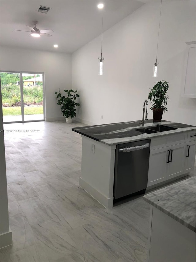 4568/4570 Golfview Blvd, Lehigh Acres, FL 33973 - kitchen with dishwashing machine, ceiling fan, hanging light fixtures, white cabinetry, and recessed lighting
