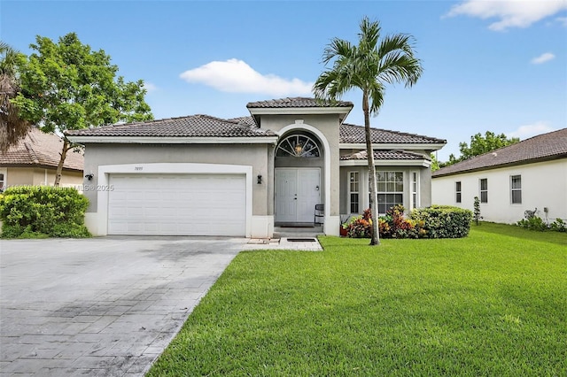 7095 E Tropical Way, Plantation, FL 33317 - mediterranean / spanish house with a garage, a tile roof, decorative driveway, a front lawn, and stucco siding