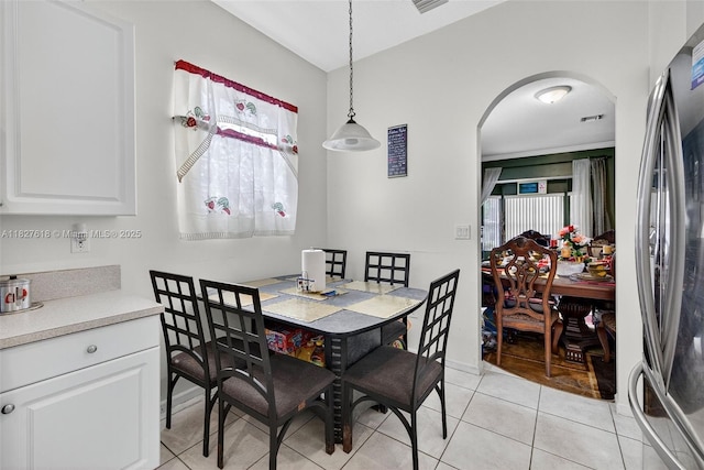 7095 E Tropical Way, Plantation, FL 33317 - dining area featuring arched walkways and light tile patterned flooring