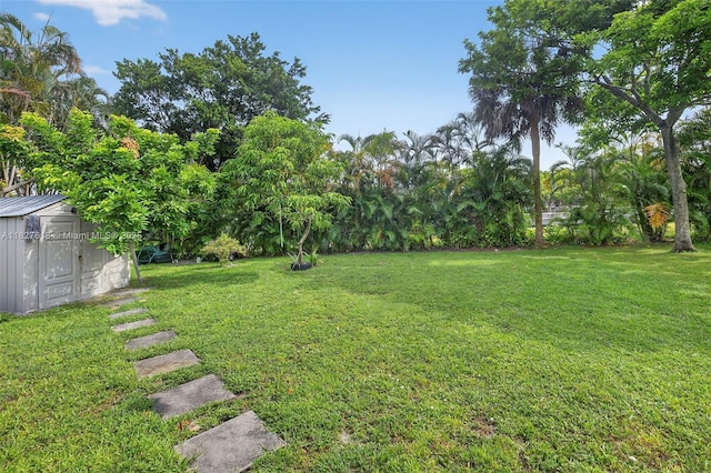 7095 E Tropical Way, Plantation, FL 33317 - view of green lawn with a storage unit