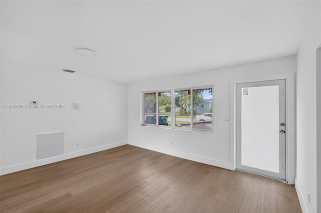 11504 SW 226th St, Miami, FL 33170 - spare room with wood finished floors and baseboards