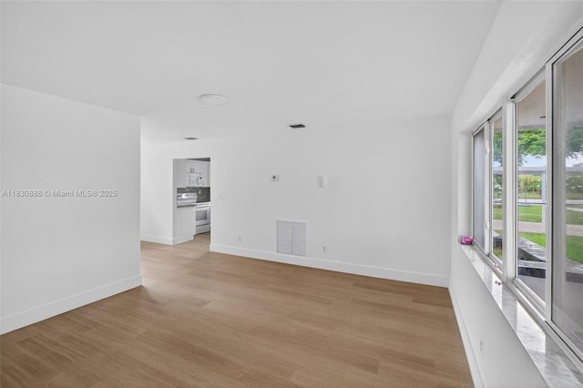 11504 SW 226th St, Miami, FL 33170 - unfurnished room featuring light wood-style floors