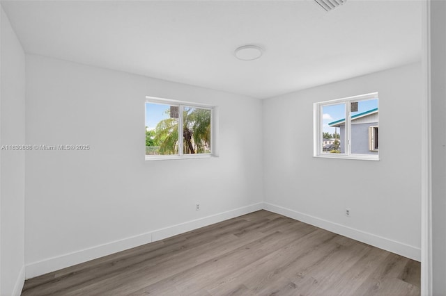 11504 SW 226th St, Miami, FL 33170 - unfurnished room with wood finished floors and baseboards