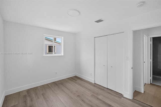 11504 SW 226th St, Miami, FL 33170 - unfurnished bedroom featuring wood finished floors and a closet