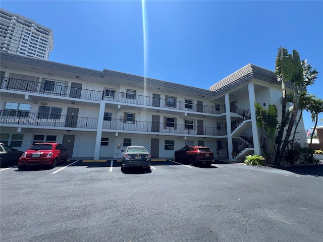 4143 N Ocean Blvd Unit 303, Fort Lauderdale, FL 33308 - view of apartment building / complex with uncovered parking