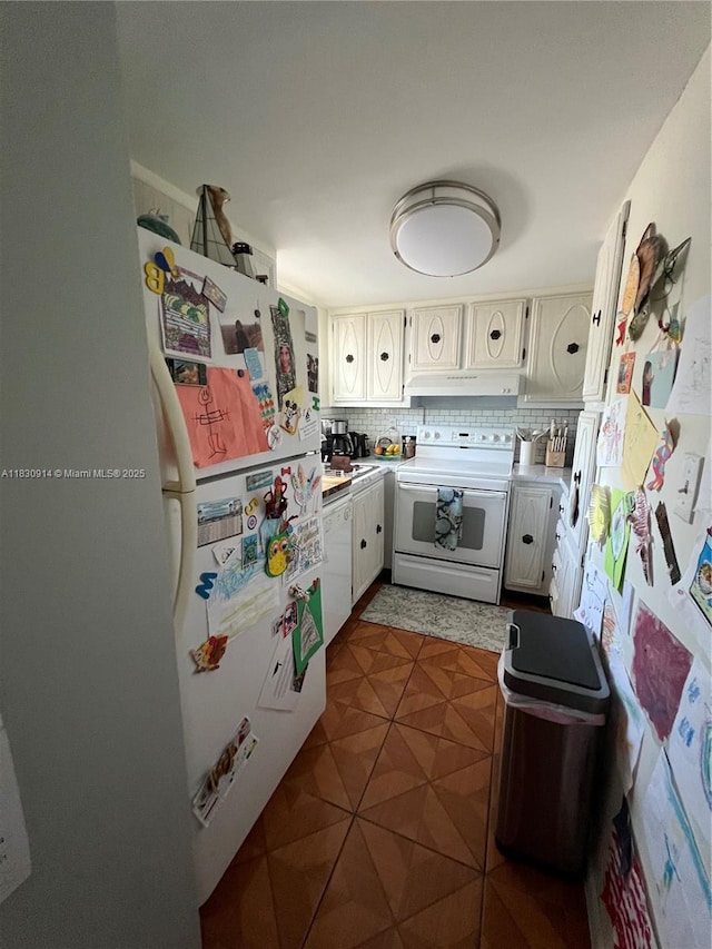 4143 N Ocean Blvd Unit 303, Fort Lauderdale, FL 33308 - kitchen with white appliances, under cabinet range hood, light countertops, and backsplash