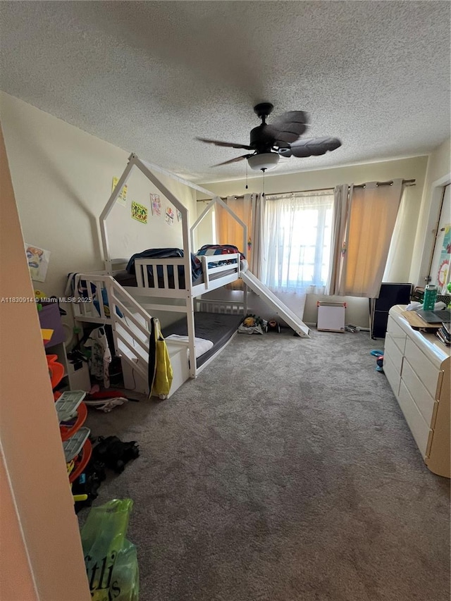 4143 N Ocean Blvd Unit 303, Fort Lauderdale, FL 33308 - carpeted bedroom featuring a textured ceiling and ceiling fan