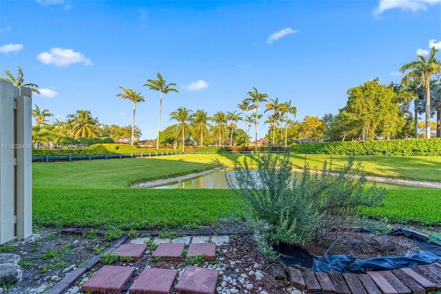 945 NE 34th Ave Unit 103, Homestead, FL 33033 - view of yard with a water view