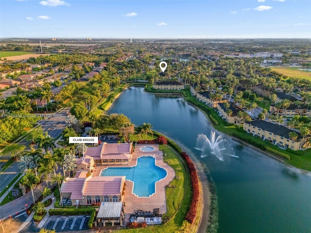 945 NE 34th Ave Unit 103, Homestead, FL 33033 - aerial view of property and surrounding area featuring a nearby body of water and a pool area