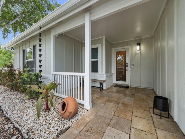 14913 SW 143rd Ct, Miami, FL 33186 - property entrance featuring board and batten siding