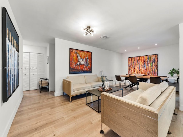 14913 SW 143rd Ct, Miami, FL 33186 - living area with light wood finished floors and recessed lighting