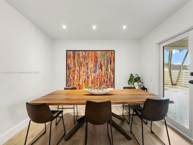 14913 SW 143rd Ct, Miami, FL 33186 - dining area with light wood-style flooring and recessed lighting
