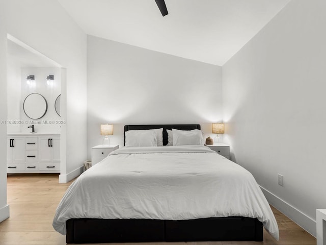14913 SW 143rd Ct, Miami, FL 33186 - bedroom featuring light wood-style floors, lofted ceiling, ensuite bathroom, and a ceiling fan