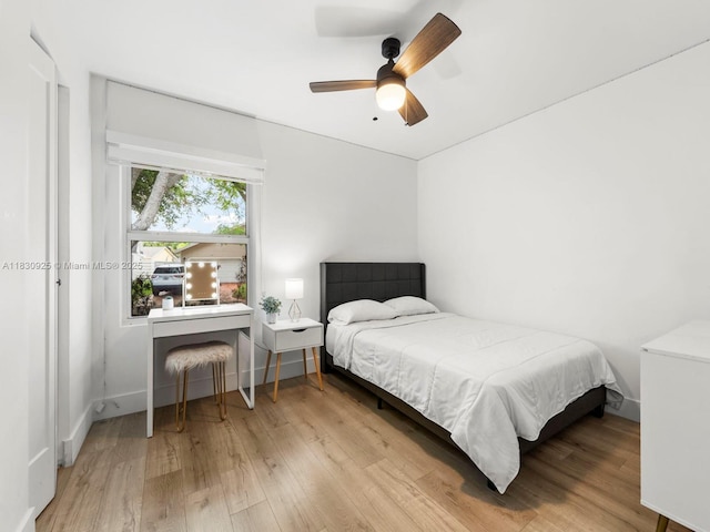 14913 SW 143rd Ct, Miami, FL 33186 - bedroom with wood finished floors and a ceiling fan