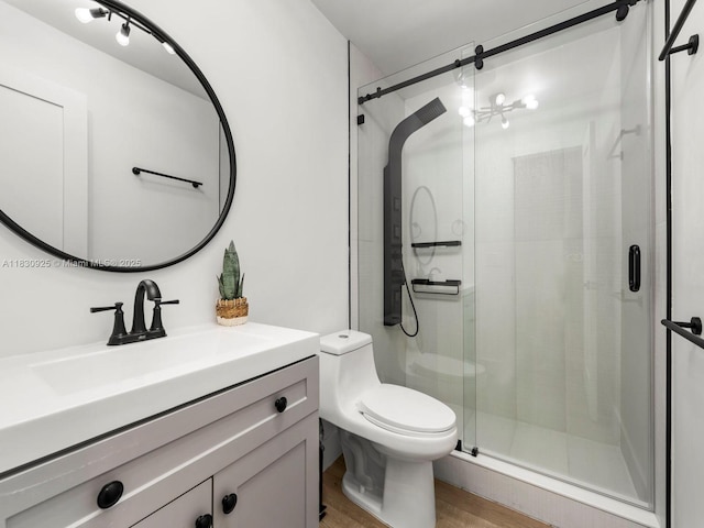 14913 SW 143rd Ct, Miami, FL 33186 - bathroom featuring a stall shower, wood finished floors, and vanity