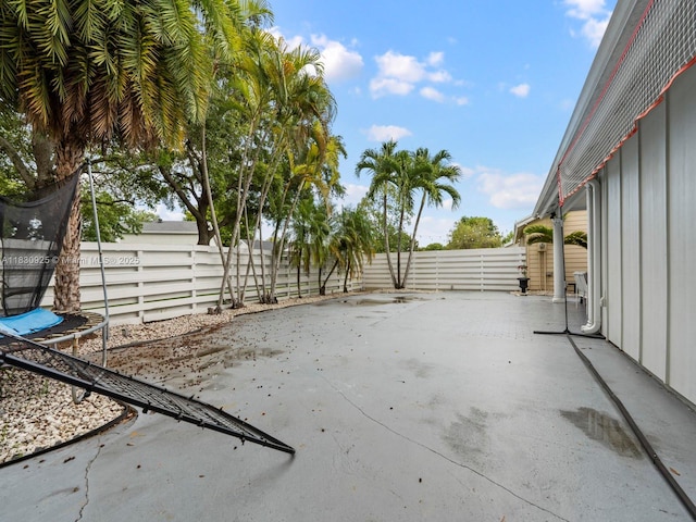 14913 SW 143rd Ct, Miami, FL 33186 - fenced backyard featuring a patio area