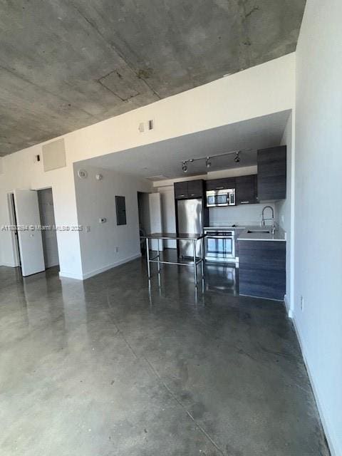 151 SE 1st St Unit 1607, Miami, FL 33131 - unfurnished living room with concrete flooring and a sink