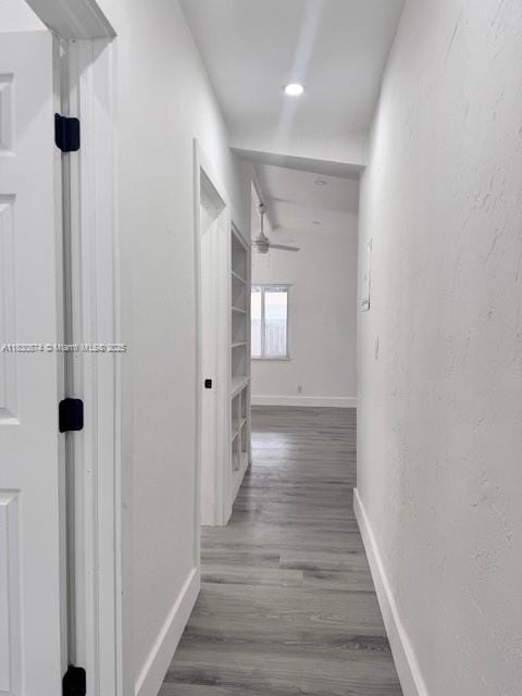 1108 SW 22nd Ave, Fort Lauderdale, FL 33312 - corridor with baseboards and wood finished floors
