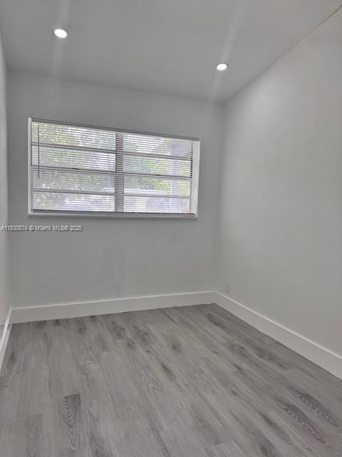1108 SW 22nd Ave, Fort Lauderdale, FL 33312 - unfurnished room with wood finished floors and recessed lighting