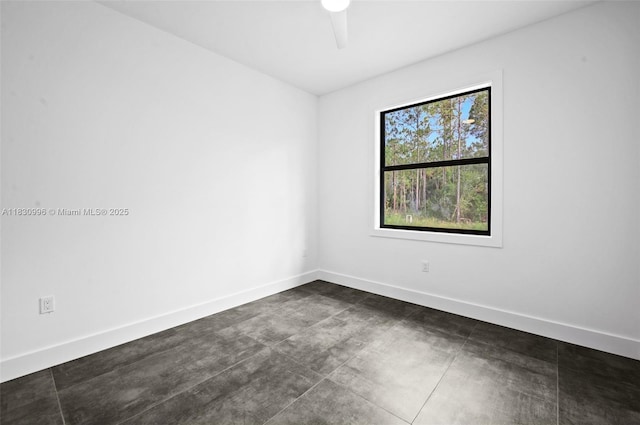 3324 NE 27, Naples, FL 34120 - unfurnished room with concrete floors and ceiling fan