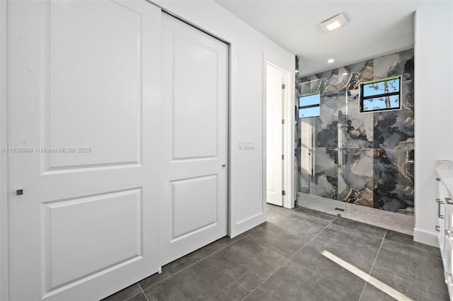 3324 NE 27, Naples, FL 34120 - bathroom featuring a marble finish shower and vanity