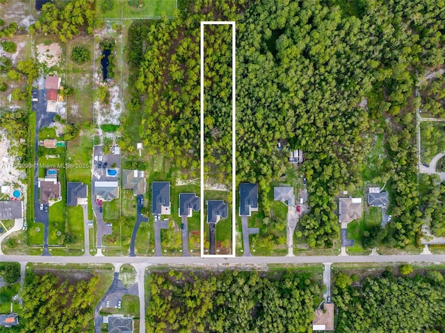 3324 NE 27, Naples, FL 34120 - aerial view of property and surrounding area with property parcel outlined