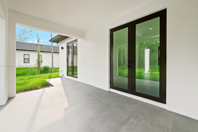 3324 NE 27, Naples, FL 34120 - view of patio / terrace with french doors