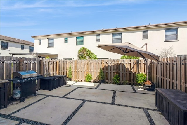 12974 SW 232nd Ln Unit 0, Homestead, FL 33170 - fenced backyard with a patio and a grill