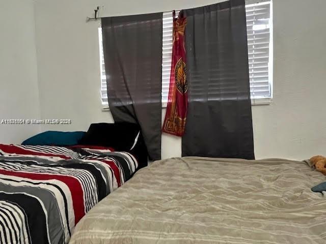 12890 NE 8th Ave Unit 102, North Miami, FL 33161 - view of bedroom